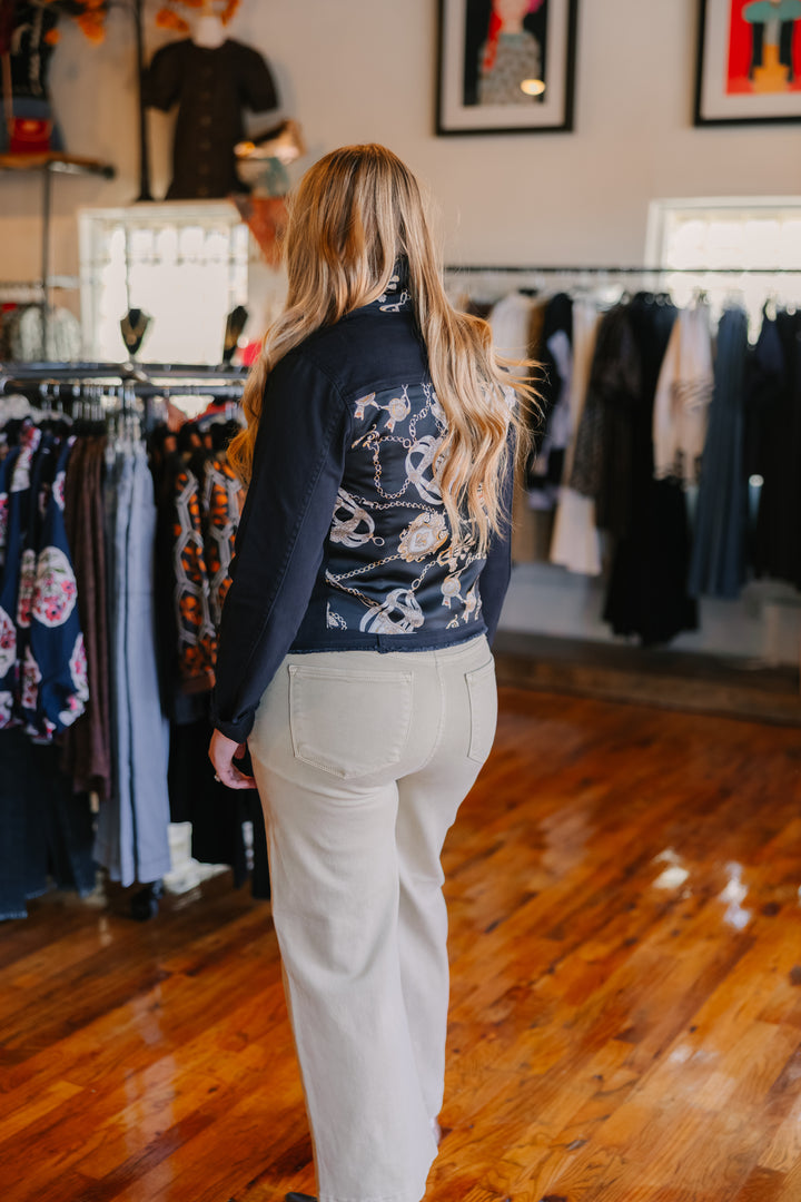 The Black Denim Jacket With Black Stirrups